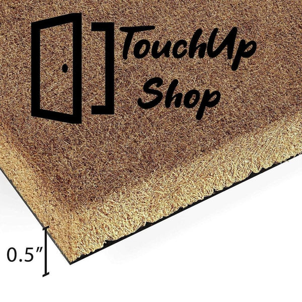 A close-up view of a textured surface, possibly a woven material or a natural plant fiber, with a warm, golden-brown color.