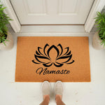 Namaste lotus flower doormat for front porch entry, featuring a natural coir fiber welcome mat with a black yoga inspired design, perfect for a zen home entrance or outdoor floor decor for a peaceful and inviting entryway look.