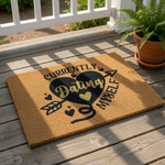 Currently Dating Myself coir doormat with a black heart and arrow design, this funny welcome mat for front porch entryways features durable natural fiber construction for a humorous and stylish home decor entrance statement.