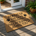 Funny Beware of the Dog and Cat doormat made of natural coir fiber, featuring humorous text about a shady cat and dog paw prints, perfect for a front porch entrance or as a unique housewarming gift for pet owners who love animal