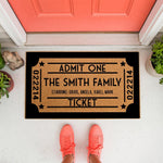 Personalized movie ticket doormat for front porch entry, featuring a custom family name and date design on natural coir fiber.