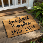 Fall pumpkin spice latte doormat with funny autumn quote, featuring a natural coir fiber welcome mat for front porch decor that adds a cozy seasonal touch to your home entrance for the autumn season and coffee lovers everywhere.