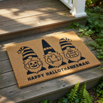 Holiday gnome doormat featuring three gnomes representing fall and winter seasons with a pumpkin, leaf, and gift, printed on a natural coir welcome mat for front porch decor during the autumn and winter holiday season.
