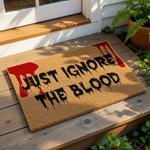 Funny Halloween doormat with Just Ignore The Blood text and red splatter design, this spooky coir welcome mat is a perfect horror movie front porch decor piece for a scary home entrance or a creepy housewarming gift for horror