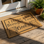 Book lover doormat with I Hope You Brought Your Books text and stacks of books illustration, this natural coir fiber welcome mat is a funny front porch rug for readers, librarians, and home decor for bookish entryways and