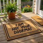 Funny I Am Not Your Doormat coir welcome mat with a bold black border and sarcastic text, this natural fiber outdoor rug serves as a humorous front porch entry mat for home decor that makes a bold statement to every visitor at