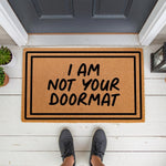 Funny I Am Not Your Doormat coir welcome mat for front porch decor, featuring bold black text on a natural fiber rug that makes a sarcastic statement for your home entryway, housewarming, or apartment doorstep entrance.
