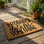Funny coir doormat with the text Probably Late For Something printed in black script and block lettering, this natural fiber welcome mat is a humorous front porch decor piece for your home entrance or apartment entryway floor.