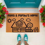 Personalized Nana and Papaw home doormat featuring a cute house, sun, and tree illustration on natural coir fiber.