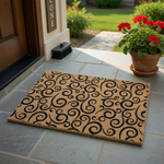 Black Swirl Pattern Coir Doormat featuring a natural tan fiber texture with a repeating elegant black scrollwork design, providing a durable and stylish entryway floor covering for your home porch or front door area.