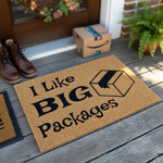 I Like Big Packages funny doormat featuring a natural coir fiber texture and bold black text with a graphic of a cardboard shipping box, making it a humorous and welcoming front porch decor piece for any home entrance.