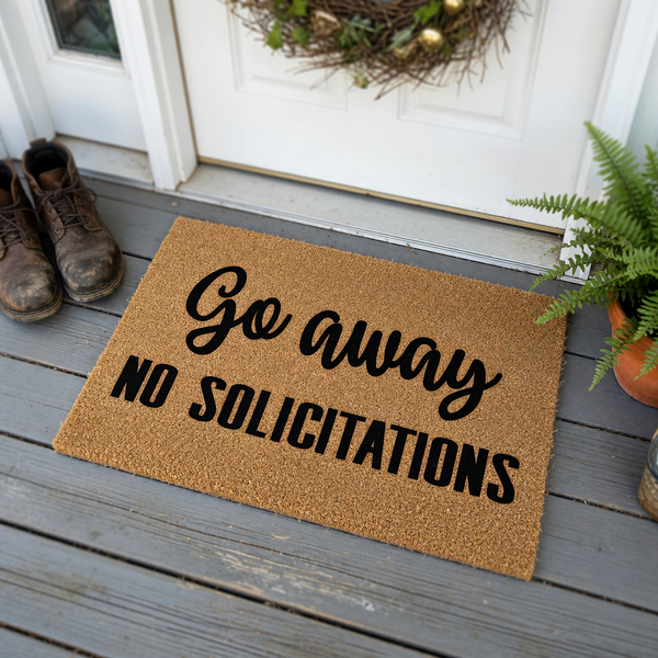 Go Away No Solicitations doormat made of natural coir fiber with a textured brown surface, featuring bold black lettering that clearly communicates a humorous message to visitors at your front door entrance.