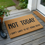 Funny Not Today I Don't Want To Get Serial Killed coir doormat featuring bold black text printed on a natural brown coconut fiber mat, providing a humorous and welcoming touch to your front porch entryway decor on a plain white