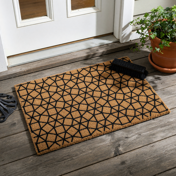 Geometric Pattern Coir Doormat featuring a bold black interlocking lattice design printed on a natural tan coconut fiber surface, providing a modern and durable entryway accent for your home porch or front door decor.