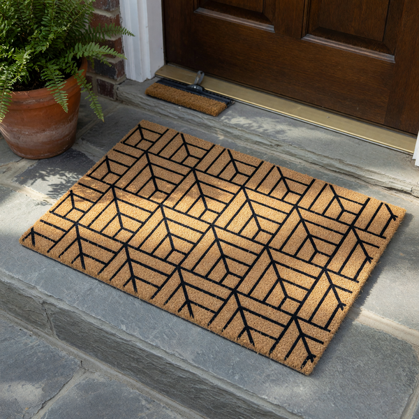 Modern Geometric Pattern Coir Doormat featuring a repeating black line design on a natural tan fiber background, providing a stylish and durable welcome mat for your front porch entrance that complements any contemporary home