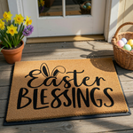 Easter Blessings coir doormat featuring a natural brown fiber texture and black script lettering with cute bunny ears integrated into the design, making it a festive spring front porch decor piece for your home entrance.