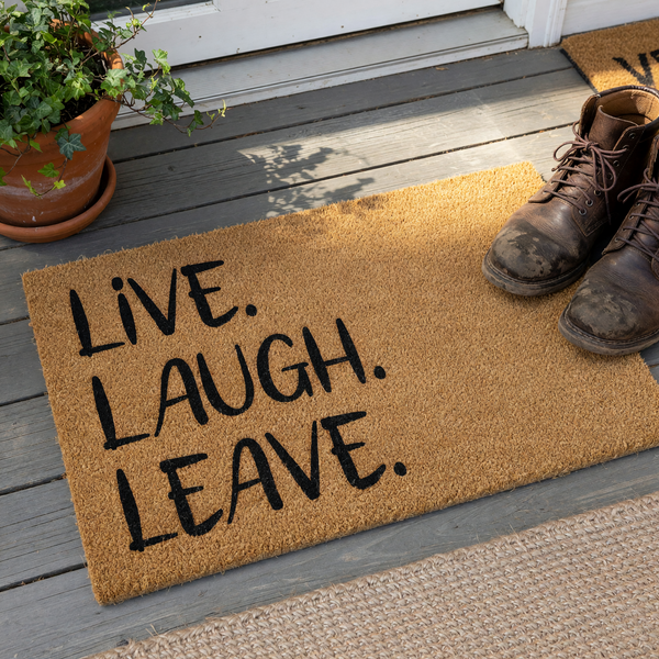 Live Laugh Leave coir doormat featuring bold black lettering on a natural brown textured fiber surface, providing a humorous and welcoming touch to your front porch entryway decor for guests arriving at your home.