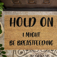 Hold On I Might be Breastfeeding Funny Doormat
