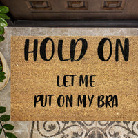Hold On Let Me Put on My Bra Funny Doormat
