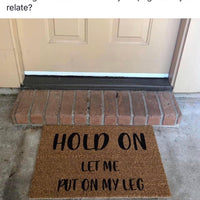 Hold On  Let me put on my leg Amputee Doormat